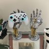 078827f4-3631-4bad-955a-4436b62b8fce.jpg Cyberpunk Controller Stand – حامل عصري بتصميم سايبربانك ثلاثي الأبعاد