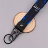 0db1cb851a0f4bd58209bbacbef94410-goods.jpeg سلسلة مفاتيح أنمي – تصميم شخصيات لطيف مع نقشة دوامات زرقاء وسوداء