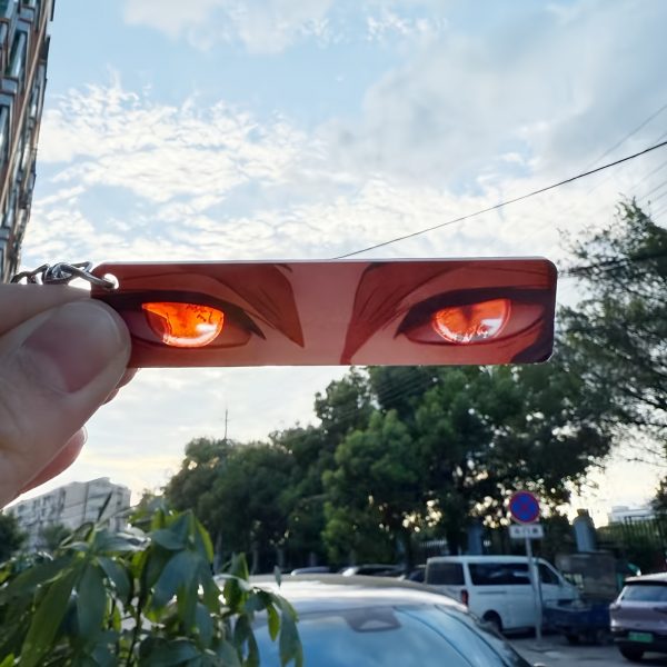 0f4be821-02bf-4f3c-81e3-70a19c2a08f8.jpg مجموعة 9 قطع من سلاسل مفاتيح أنمي – عيون مضيئة بتفاعل الشمس