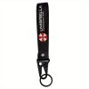 1727692212650-ebda0c4f1c764f6a84859ddbcbdf97cd-goods.jpeg سلسلة مفاتيح Umbrella Corporation – إكسسوار مميز