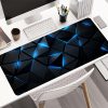 395e360f-71e4-4a9d-8432-2b0805316d8e.jpg Large Tech-Themed 3D Gaming Mouse Pad – تصميم هندسي مستقبلي أزرق