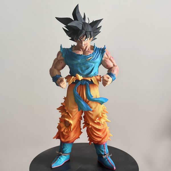 4860c113-4eb9-49da-8446-1b1af2a31a06.jpg Dragon Z – Super Saiyan Goku Action Figure
