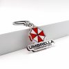 493a9ada-eadd-416b-a65c-a2d5f43e4351.jpg سلسلة مفاتيح Umbrella Corporation – رمز Biohazard الشهير