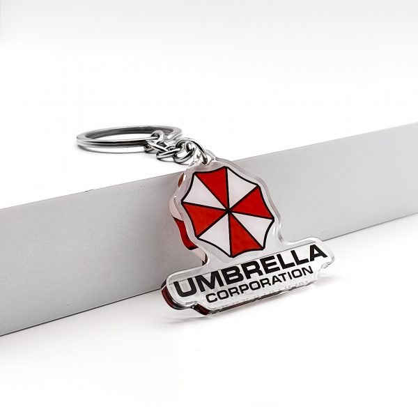 493a9ada-eadd-416b-a65c-a2d5f43e4351.jpg سلسلة مفاتيح Umbrella Corporation – رمز Biohazard الشهير