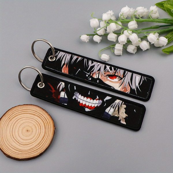 558e877767b34d58a30de53bab74d5f3-goods.jpeg سلسلة مفاتيح أنمي – تصميم قماش كرتوني ملون وعصري