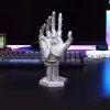 5663f81f-9016-4b75-99fc-98a650f6ccc5.jpg Cyberpunk Controller Stand – حامل عصري بتصميم سايبربانك ثلاثي الأبعاد