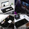 5719dd80-6034-4a08-abef-1399715351c1.jpg Extra-Large Gaming Mouse Pad – تصميم أنيق أبيض وأسود لعشاق الـSetup النظيف