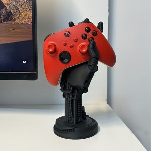 5c184767-ab6f-4c9f-8cc1-03c3f0a260bb.jpg Cyberpunk Controller Stand – حامل عصري بتصميم سايبربانك ثلاثي الأبعاد