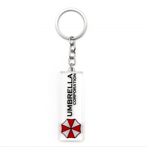 6d57ff9a-80aa-48e7-8dad-f6fbba8b1c13.jpg سلسلة مفاتيح Umbrella Corporation – رمز Biohazard الشهير