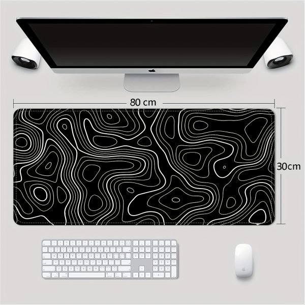 807909f7-a84a-475d-be6c-31a4a8f07780.jpg Extra-Large Gaming Mouse Pad – تصميم أنيق أبيض وأسود لعشاق الـSetup النظيف