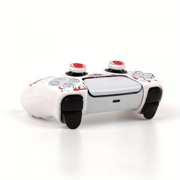 8d1975f661f94bc6aa9130e266cfa914-goods.jpeg غطاء يد تحكم PS5 – تصميم الجمجمة القوطي مع أزرار PS باللونين الأحمر والأسود