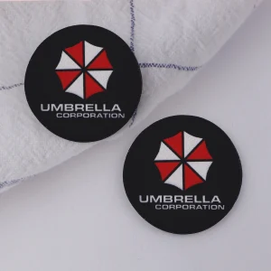 Sabe31eb056f44149bc8bf82d1f523708J.webp طقم قواعد أكواب بتصميم Umbrella من لعبة Resident Evil (عدد 2 قطعة)