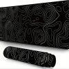 ba1ae382-d7c2-4d94-9a98-05c87a880fc1.jpg Extra-Large Gaming Mouse Pad – تصميم أنيق أبيض وأسود لعشاق الـSetup النظيف