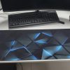 e9eb85bf0b324babf1f45ca151083b060c48cf3b.temu_.000001.jpeg Large Tech-Themed 3D Gaming Mouse Pad – تصميم هندسي مستقبلي أزرق