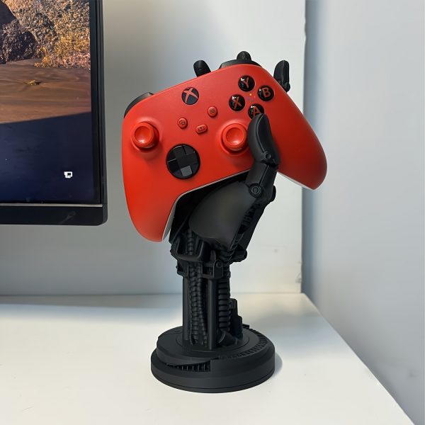 f72a2abd-faaf-47d2-996d-6f2548bf3e1e.jpg Cyberpunk Controller Stand – حامل عصري بتصميم سايبربانك ثلاثي الأبعاد